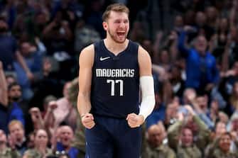 DALLAS, TEXAS - NOVEMBER 06: Luka Doncic #77 of the Dallas Mavericks celebrates after the Dallas Mavericks scored against the Orlando Magic in the second half at American Airlines Center on November 06, 2019 in Dallas, Texas. NOTE TO USER: User expressly acknowledges and agrees that, by downloading and or using this photograph, User is consenting to the terms and conditions of the Getty Images License Agreement. (Photo by Tom Pennington/Getty Images)