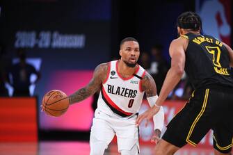 Orlando, FL - AUGUST 24: Damian Lillard #0 of the Portland Trail Blazers handles the ball during the game against the Los Angeles Lakers during Round One Game Four of the NBA Playoffs on August 24, 2020 at The AdventHealth Arena at ESPN Wide World Of Sports Complex in Orlando, Florida. NOTE TO USER: User expressly acknowledges and agrees that, by downloading and/or using this Photograph, user is consenting to the terms and conditions of the Getty Images License Agreement. Mandatory Copyright Notice: Copyright 2020 NBAE (Photo by Garrett Ellwood/NBAE via Getty Images)
