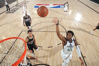 ORLANDO, FL - SEPTEMBER 1: Donovan Mitchell #45 of the Utah Jazz shoots the ball against the Denver Nuggets during Round One, Game Seven of the NBA Playoffs on September 1, 2020 at the AdventHealth Arena at ESPN Wide World Of Sports Complex in Orlando, Florida. NOTE TO USER: User expressly acknowledges and agrees that, by downloading and/or using this Photograph, user is consenting to the terms and conditions of the Getty Images License Agreement. Mandatory Copyright Notice: Copyright 2020 NBAE (Photo by Garrett Ellwood/NBAE via Getty Images)