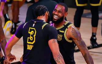 LAKE BUENA VISTA, FLORIDA - SEPTEMBER 20: LeBron James #23 of the Los Angeles Lakers celebrates with Anthony Davis #3 of the Los Angeles Lakers after shooting a three point basket to win the game over Denver Nuggets in Game Two of the Western Conference Finals during the 2020 NBA Playoffs at AdventHealth Arena at the ESPN Wide World Of Sports Complex on September 20, 2020 in Lake Buena Vista, Florida. NOTE TO USER: User expressly acknowledges and agrees that, by downloading and or using this photograph, User is consenting to the terms and conditions of the Getty Images License Agreement. (Photo by Kevin C. Cox/Getty Images)