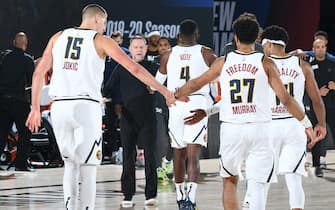 ORLANDO, FL - SEPTEMBER 26: Nikola Jokic #15 and Jamal Murray #27 of the Denver Nuggets hi-five during the game against the Los Angeles Lakers during Game Five of the Western Conference Finals on September 26, 2020 in Orlando, Florida at AdventHealth Arena. NOTE TO USER: User expressly acknowledges and agrees that, by downloading and/or using this Photograph, user is consenting to the terms and conditions of the Getty Images License Agreement. Mandatory Copyright Notice: Copyright 2020 NBAE (Photo by Andrew D. Bernstein/NBAE via Getty Images)