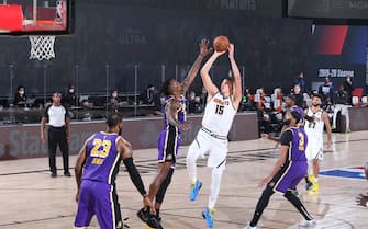 ORLANDO, FL - SEPTEMBER 26: Nikola Jokic #15 of the Denver Nuggets shoots the ball against the Los Angeles Lakers during Game Five of the Western Conference Finals of the NBA Playoffs on September 26, 2020 at AdventHealth Arena in Orlando, Florida. NOTE TO USER: User expressly acknowledges and agrees that, by downloading and/or using this Photograph, user is consenting to the terms and conditions of the Getty Images License Agreement. Mandatory Copyright Notice: Copyright 2020 NBAE (Photo by Nathaniel S. Butler/NBAE via Getty Images)