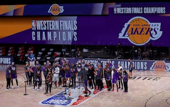 LAKE BUENA VISTA, FLORIDA - SEPTEMBER 26: The Los Angeles Lakers celebrate their win and receive a trophy for Western Finals Champions against Denver Nuggets in Game Five of the Western Conference Finals during the 2020 NBA Playoffs at AdventHealth Arena at the ESPN Wide World Of Sports Complex on September 26, 2020 in Lake Buena Vista, Florida. NOTE TO USER: User expressly acknowledges and agrees that, by downloading and or using this photograph, User is consenting to the terms and conditions of the Getty Images License Agreement. (Photo by Kevin C. Cox/Getty Images)