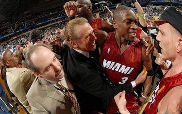 DALLAS - JUNE 20:  Head coach Pat Riley, Dwyane Wade #3  and Jason Williams #55 of the Miami Heat celebrate their 95-92 Game Six victory of the 2006 NBA Finals against the Dallas Mavericks on June 20, 2006 at American Airlines Center in Dallas, Texas. NOTE TO USER: User expressly acknowledges and agrees that, by downloading and or using this photograph, User is consenting to the terms and conditions of the Getty Images License Agreement. Mandatory Copyright Notice: Copyright 2006 NBAE (Photo by Andrew D. Bernstein/NBAE via Getty Images)