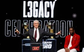 MIAMI, FLORIDA - FEBRUARY 21:  President Pat Riley of the Miami Heat talks to former player Dwyane Wade during the Miami Heat Dwyane Wade L3GACY Celebration at American Airlines Arena on February 21, 2020 in Miami, Florida. (Photo by Michael Reaves/Getty Images)