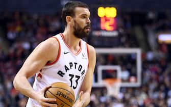 TORONTO, ON - DECEMBER 03:  Marc Gasol #33 of the Toronto Raptors passes the ball during the second half of an NBA game against the Miami Heat at Scotiabank Arena on December 03, 2019 in Toronto, Canada.  NOTE TO USER: User expressly acknowledges and agrees that, by downloading and or using this photograph, User is consenting to the terms and conditions of the Getty Images License Agreement.  (Photo by Vaughn Ridley/Getty Images)