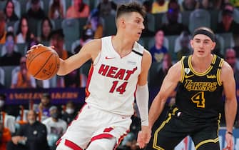 ORLANDO, FL - OCTOBER 02: Tyler Herro #14 of the Miami Heat drives to the basket around Alex Caruso #4 of the Los Angeles Lakers during Game Two of the NBA Finals on October 2, 2020 in Orlando, Florida at AdventHealth Arena. NOTE TO USER: User expressly acknowledges and agrees that, by downloading and/or using this Photograph, user is consenting to the terms and conditions of the Getty Images License Agreement. Mandatory Copyright Notice: Copyright 2020 NBAE (Photo by Jesse D. Garrabrant/NBAE via Getty Images)