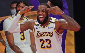 ORLANDO, FL - OCTOBER 11: LeBron James #23 of the Los Angeles Lakers smiles and celebrates on court after winning Game Six of the NBA Finals against the Miami Heat on October 11, 2020 in Orlando, Florida at AdventHealth Arena. NOTE TO USER: User expressly acknowledges and agrees that, by downloading and/or using this Photograph, user is consenting to the terms and conditions of the Getty Images License Agreement. Mandatory Copyright Notice: Copyright 2020 NBAE (Photo by Jesse D. Garrabrant/NBAE via Getty Images)