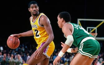 INGLEWOOD, CA - CIRCA 1985: Magic Johnson #32 of the Los Angeles Lakers dribbles against Dennis Johnson #3 of the Boston Celtics during the 1985 NBA Finals circa 1985 at the Great Western Forum in Inglewood, California. NOTE TO USER: User expressly acknowledges and agrees that, by downloading and or using this photograph, User is consenting to the terms and conditions of the Getty Images License Agreement. Mandatory Copyright Notice: Copyright 1985 NBAE (Photo by Ron Koch/NBAE via Getty Images)