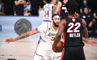 ORLANDO, FL - OCTOBER 4: Anthony Davis #3 of the Los Angeles Lakers plays defense against Jimmy Butler #22 of the Miami Heat during Game Three of the NBA Finals on October 4, 2020 at the AdventHealth Arena at ESPN Wide World Of Sports Complex in Orlando, Florida. NOTE TO USER: User expressly acknowledges and agrees that, by downloading and/or using this Photograph, user is consenting to the terms and conditions of the Getty Images License Agreement. Mandatory Copyright Notice: Copyright 2020 NBAE (Photo by Garrett Ellwood/NBAE via Getty Images)