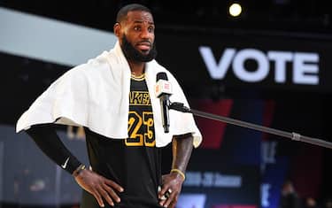 Orlando, FL - SEPTEMBER 6: LeBron James #23 of the Los Angeles Lakers gets interviewed after the game against the Houston Rockets during Game Two of the Western Conference Semifinals on September 6, 2020 in Orlando, Florida at AdventHealth Arena. NOTE TO USER: User expressly acknowledges and agrees that, by downloading and/or using this Photograph, user is consenting to the terms and conditions of the Getty Images License Agreement. Mandatory Copyright Notice: Copyright 2020 NBAE (Photo by Andrew D. Bernstein/NBAE via Getty Images)