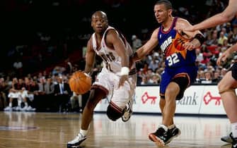 15 Feb 1999:  Nick Van Exel #31 of the Denver Nuggets dribbles the ball during the game against the  Phoenix Suns at the McNichols Sports Arena in Denver, Colorado. The Suns defeated the Nuggets 115-105.  Mandatory Credit: Brian Bahr  /Allsport