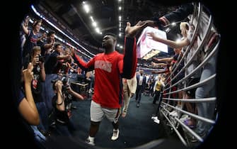 NEW ORLEANS, LA - October 11: Zion Williamson #1 of the New Orleans Pelicans high fives fans after a pre-season game against the Utah Jazz on October 11, 2019 at the Smoothie King Center in New Orleans, Louisiana. NOTE TO USER: User expressly acknowledges and agrees that, by downloading and or using this Photograph, user is consenting to the terms and conditions of the Getty Images License Agreement. Mandatory Copyright Notice: Copyright 2019 NBAE (Photo by Layne Murdoch Jr./NBAE via Getty Images)