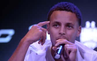 National Basketball Association (NBA) Golden State Warriors and 2014-2015 season Most Valuable Player (MVP) Stephen Curry gestures during a press conference in Manila on September 5, 2015. Curry started his three-nation (Japan, China and Philippines) Under Armour Asia tour to promote the company's limited edition basketball shoes, "UA Curry II". AFP PHOTO /  NOEL CELIS        (Photo credit should read NOEL CELIS/AFP via Getty Images)