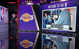 BRISTOL, CT - NOVEMBER 18: NBA Commissioner, Adam Silver reacts to Jaden McDaniels being drafted twenty eight overall pick for the Los Angeles Lakers during the 2020 NBA Draft on November 18, 2020 in Bristol, Connecticut at ESPN Headquarters. NOTE TO USER: User expressly acknowledges and agrees that, by downloading and/or using this photograph, user is consenting to the terms and conditions of the Getty Images License Agreement. Mandatory Copyright Notice: Copyright 2020 NBAE (Photo by Nathaniel S. Butler/NBAE via Getty Images)