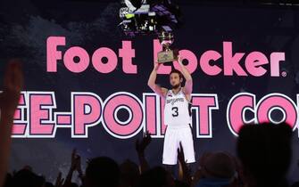 469639211 NEW ORLEANS, LA - FEBRUARY 15: Marco Belinelli #8 of the San Antonio Spurs holds his trophy after winning the Foot Locker Three-Point Contest on State Farm All-Star Saturday Night as part of the 2014 All-Star Weekend at Smoothie King Center on February 15, 2014 in New Orleans, Louisiana. NOTE TO USER: User expressly acknowledges and agrees that, by downloading and/or using this photograph, user is consenting to the terms and conditions of the Getty Images License Agreement. Mandatory Copyright Notice: Copyright 2014 NBAE (Photo by Ron Hoskins/NBAE via Getty Images)