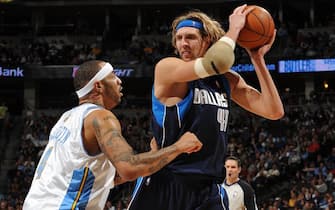 DENVER - DECEMBER 27:  Dirk Nowitzki #41 of the Dallas Mavericks looks to move the ball against Kenyon Martin #4 of the Denver Nuggets during the game on December 27, 2009 at the Pepsi Center in Denver, Colorado. The Mavericks won 104-96. NOTE TO USER: User expressly acknowledges and agrees that, by downloading and/or using this Photograph, user is consenting to the terms and conditions of the Getty Images License Agreement. Mandatory Copyright Notice: Copyright 2009 NBAE (Photo by Garrett W. Ellwood/NBAE via Getty Images)