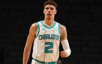 CHARLOTTE, NC - December 12: LaMelo Ball #2 of the Charlotte Hornets looks on during a preseason game against the Toronto Raptors on December 12, 2020 at Spectrum Center in Charlotte, North Carolina. NOTE TO USER: User expressly acknowledges and agrees that, by downloading and or using this photograph, User is consenting to the terms and conditions of the Getty Images License Agreement.  Mandatory Copyright Notice:  Copyright 2020 NBAE (Photo by Brock Williams-Smith/NBAE via Getty Images)