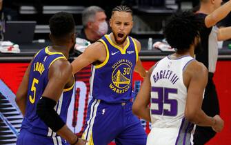 SACRAMENTO, CALIFORNIA - DECEMBER 15:  Stephen Curry #30 of the Golden State Warriors reacts after making a three-point basket against the Sacramento Kings in the first quarter at Golden 1 Center on December 15, 2020 in Sacramento, California.  NOTE TO USER: User expressly acknowledges and agrees that, by downloading and or using this photograph, User is consenting to the terms and conditions of the Getty Images License Agreement.  (Photo by Ezra Shaw/Getty Images)