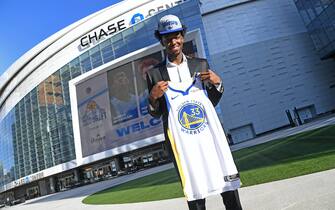 SAN FRANCISCO, CA - NOVEMBER 19: James Wiseman of the Golden State Warriors smiles and poses for a photo during a draftee press conference on November 19, 2020 in San Francisco, California at the Chase Center. NOTE TO USER: User expressly acknowledges and agrees that, by downloading and or using this photograph, user is consenting to the terms and conditions of Getty Images License Agreement. Mandatory Copyright Notice: Copyright 2020 NBAE (Photo by Noah Graham/NBAE via Getty Images)