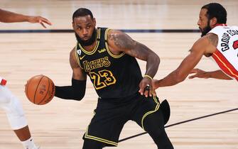 LAKE BUENA VISTA, FLORIDA - OCTOBER 09: LeBron James #23 of the Los Angeles Lakers looks to pass during the third quarter against the Miami Heat in Game Five of the 2020 NBA Finals at AdventHealth Arena at the ESPN Wide World Of Sports Complex on October 9, 2020 in Lake Buena Vista, Florida. NOTE TO USER: User expressly acknowledges and agrees that, by downloading and or using this photograph, User is consenting to the terms and conditions of the Getty Images License Agreement. (Photo by Mike Ehrmann/Getty Images)