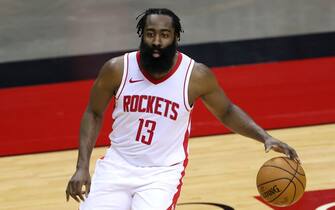 HOUSTON, TEXAS - DECEMBER 17: James Harden #13 of the Houston Rockets controls the ball during the first half of a game against the San Antonio Spurs at the Toyota Center on December 17, 2020 in Houston, Texas. NOTE TO USER: User expressly acknowledges and agrees that, by downloading and or using this photograph, User is consenting to the terms and conditions of the Getty Images License Agreement. (Photo by Carmen Mandato/Getty Images)