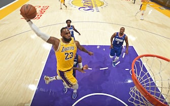 LOS ANGELES, CA - DECEMBER 22: LeBron James #23 of the Los Angeles Lakers dunks the ball against the LA Clippers on December 22, 2020 at STAPLES Center in Los Angeles, California. NOTE TO USER: User expressly acknowledges and agrees that, by downloading and/or using this Photograph, user is consenting to the terms and conditions of the Getty Images License Agreement. Mandatory Copyright Notice: Copyright 2020 NBAE (Photo by Andrew D. Bernstein/NBAE via Getty Images)