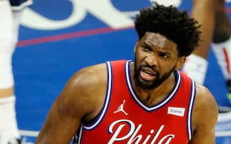 PHILADELPHIA, PENNSYLVANIA - DECEMBER 23: Joel Embiid #21 of the Philadelphia 76ers reacts following a foul call during the second quarter against the Washington Wizards at Wells Fargo Center on December 23, 2020 in Philadelphia, Pennsylvania. NOTE TO USER: User expressly acknowledges and agrees that, by downloading and/or using this photograph, user is consenting to the terms and conditions of the Getty Images License Agreement. (Photo by Tim Nwachukwu/Getty Images)