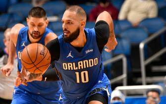 ORLANDO, FL - DECEMBER 23: Evan Fournier #10 of the Orlando Magic dribbles the ball up court against the Miami Heat on December 23, 2020 at Amway Center in Orlando, Florida.  NOTE TO USER: User expressly acknowledges and agrees that, by downloading and or using this photograph, User is consenting to the terms and conditions of the Getty Images License Agreement. Mandatory Copyright Notice: Copyright 2020 NBAE  (Photo by Gary Bassing/NBAE via Getty Images)