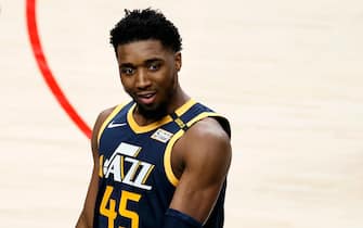 PORTLAND, OREGON - DECEMBER 23:  Donovan Mitchell #45 of the Utah Jazz reacts after a foul against the Portland Trail Blazers during the third quarter at Moda Center on December 23, 2020 in Portland, Oregon. NOTE TO USER: User expressly acknowledges and agrees that, by downloading and or using this photograph, User is consenting to the terms and conditions of the Getty Images License Agreement. (Photo by Steph Chambers/Getty Images) (Photo by Steph Chambers/Getty Images)