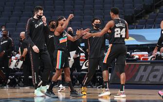 MEMPHIS, TN - DECEMBER 23: The San Antonio Spurs hi-five during the game against the Memphis Grizzlies on December 23, 2020 at FedExForum in Memphis, Tennessee. NOTE TO USER: User expressly acknowledges and agrees that, by downloading and or using this photograph, User is consenting to the terms and conditions of the Getty Images License Agreement. Mandatory Copyright Notice: Copyright 2020 NBAE (Photo by Joe Murphy/NBAE via Getty Images)