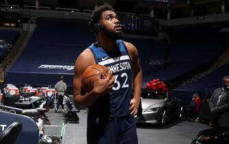 MINNEAPOLIS, MN - DECEMBER 23: Karl-Anthony Towns #32 of the Minnesota Timberwolves talks to the media after the game against the Detroit Pistons on December 23, 2020 at Target Center in Minneapolis, Minnesota. NOTE TO USER: User expressly acknowledges and agrees that, by downloading and or using this Photograph, user is consenting to the terms and conditions of the Getty Images License Agreement. Mandatory Copyright Notice: Copyright 2020 NBAE (Photo by David Sherman/NBAE via Getty Images)