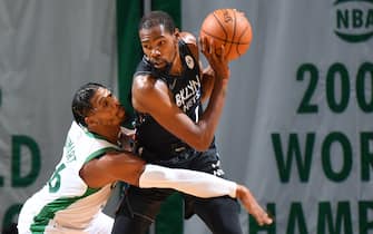 BOSTON, MA - DECEMBER 25: Kevin Durant #7 of the Brooklyn Nets handles the ball against the Boston Celtics during a game on December 25, 2020 at the TD Garden in Boston, Massachusetts.  NOTE TO USER: User expressly acknowledges and agrees that, by downloading and or using this photograph, User is consenting to the terms and conditions of the Getty Images License Agreement. Mandatory Copyright Notice: Copyright 2020 NBAE  (Photo by Brian Babineau/NBAE via Getty Images)