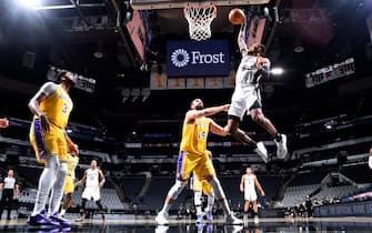 SAN ANTONIO, TX - DECEMBER 30: Dejounte Murray #5 of the San Antonio Spurs shoots the ball during the game against the Los Angeles Lakers on December 30, 2020 at the AT&T Center in San Antonio, Texas. NOTE TO USER: User expressly acknowledges and agrees that, by downloading and or using this photograph, user is consenting to the terms and conditions of the Getty Images License Agreement. Mandatory Copyright Notice: Copyright 2020 NBAE (Photos by Logan Riely/NBAE via Getty Images)