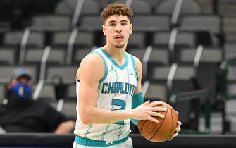 DALLAS, TX - DECEMBER 30: LaMelo Ball #2 of the Charlotte Hornets dribbles the ball during the game against the Dallas Mavericks on December 30, 2020 at the American Airlines Center in Dallas, Texas. NOTE TO USER: User expressly acknowledges and agrees that, by downloading and or using this photograph, User is consenting to the terms and conditions of the Getty Images License Agreement. Mandatory Copyright Notice: Copyright 2020 NBAE (Photo by Glenn James/NBAE via Getty Images)