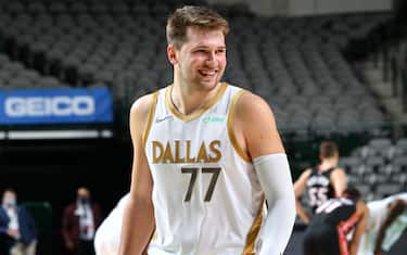 DALLAS, TX - JANUARY 1: Luka Doncic #77 of the Dallas Mavericks looks on, on January 1, 2021 at the American Airlines Center in Dallas, Texas. NOTE TO USER: User expressly acknowledges and agrees that, by downloading and or using this photograph, User is consenting to the terms and conditions of the Getty Images License Agreement. Mandatory Copyright Notice: Copyright 2021 NBAE (Photo by Glenn James/NBAE via Getty Images)