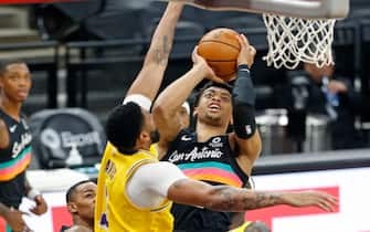 SAN ANTONIO, TX - JANUARY 1:  Keldon Johnson #3 of the San Antonio Spurs #3 shoots over Anthony Davis #3 of the Los Angeles Lakers during first half action at AT&T Center on January 1 , 2021 in San Antonio, Texas.  NOTE TO USER: User expressly acknowledges and agrees that , by downloading and or using this photograph, User is consenting to the terms and conditions of the Getty Images License Agreement. (Photo by Ronald Cortes/Getty Images)