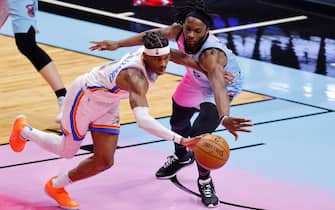 MIAMI, FLORIDA - JANUARY 04: Shai Gilgeous-Alexander #2 of the Oklahoma City Thunder and Precious Achiuwa #5 of the Miami Heat battle for a loose ball during the third quarter at American Airlines Arena on January 04, 2021 in Miami, Florida. NOTE TO USER: User expressly acknowledges and agrees that, by downloading and or using this photograph, User is consenting to the terms and conditions of the Getty Images License Agreement. (Photo by Michael Reaves/Getty Images)