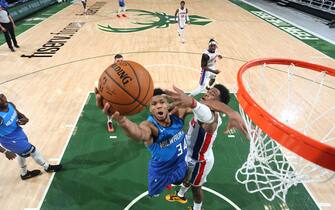 MILWAUKEE, WI - JANUARY 4: Giannis Antetokounmpo #34 of the Milwaukee Bucks drives to the basket during the game against the Detroit Pistons on January 4, 2021 at the Fiserv Forum Center in Milwaukee, Wisconsin. NOTE TO USER: User expressly acknowledges and agrees that, by downloading and or using this Photograph, user is consenting to the terms and conditions of the Getty Images License Agreement. Mandatory Copyright Notice: Copyright 2021 NBAE (Photo by Gary Dineen/NBAE via Getty Images).