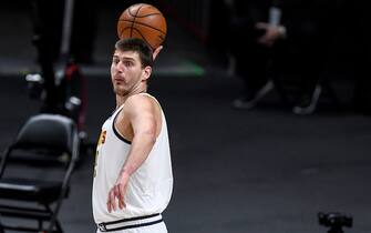 DENVER, CO - JANUARY 5: Nikola Jokic (15) of the Denver Nuggets fires an outlet pass against the Minnesota Timberwolves during the first quarter at Ball Arena on Tuesday, January 5, 2021.(Photo by AAron Ontiveroz/MediaNews Group/The Denver Post via Getty Images)