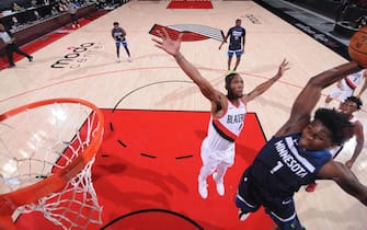 PORTLAND, OR - JANUARY 7: Anthony Edwards #1 of the Minnesota Timberwolves dunks the ball during the game against the Portland Trail Blazers on January 7, 2021 at the Moda Center Arena in Portland, Oregon. NOTE TO USER: User expressly acknowledges and agrees that, by downloading and or using this photograph, user is consenting to the terms and conditions of the Getty Images License Agreement. Mandatory Copyright Notice: Copyright 2021 NBAE (Photo by Sam Forencich/NBAE via Getty Images)
