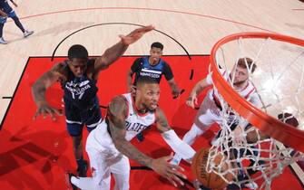 PORTLAND, OR - JANUARY 7: Damian Lillard #0 of the Portland Trail Blazers shoots the ball during the game against the Minnesota Timberwolves on January 7, 2021 at the Moda Center Arena in Portland, Oregon. NOTE TO USER: User expressly acknowledges and agrees that, by downloading and or using this photograph, user is consenting to the terms and conditions of the Getty Images License Agreement. Mandatory Copyright Notice: Copyright 2021 NBAE (Photo by Sam Forencich/NBAE via Getty Images)