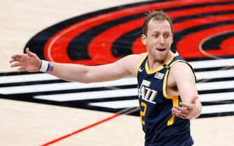 PORTLAND, OREGON - DECEMBER 23: Joe Ingles #2 of the Utah Jazz reacts during the first half of the game against the Portland Trail Blazers at Moda Center on December 23, 2020 in Portland, Oregon. NOTE TO USER: User expressly acknowledges and agrees that, by downloading and or using this photograph, User is consenting to the terms and conditions of the Getty Images License Agreement. (Photo by Steph Chambers/Getty Images)