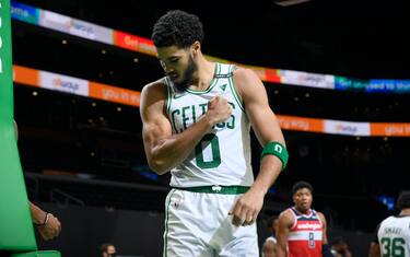 BOSTON, MA - JANUARY 8: Jayson Tatum #0 of the Boston Celtics flexes his muscle during the game against the Washington Wizards on January 8, 2021 at the TD Garden in Boston, Massachusetts.  NOTE TO USER: User expressly acknowledges and agrees that, by downloading and or using this photograph, User is consenting to the terms and conditions of the Getty Images License Agreement. Mandatory Copyright Notice: Copyright 2021 NBAE  (Photo by Brian Babineau/NBAE via Getty Images) 