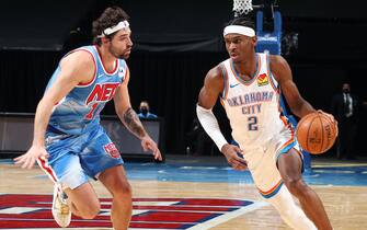 BROOKLYN, NY - JANUARY 10: Shai Gilgeous-Alexander #2 of the Oklahoma City Thunder handles the ball during the game against the Brooklyn Nets on January 10, 2021 at Barclays Center in Brooklyn, New York. NOTE TO USER: User expressly acknowledges and agrees that, by downloading and or using this Photograph, user is consenting to the terms and conditions of the Getty Images License Agreement. Mandatory Copyright Notice: Copyright 2021 NBAE (Photo by Nathaniel S. Butler/NBAE via Getty Images)