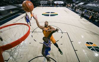 SALT LAKE CITY, UT - JANUARY 26: Rudy Gobert #27 of the Utah Jazz drives to the basket during the game against the New York Knicks on January 26, 2021 at vivint.SmartHome Arena in Salt Lake City, Utah. NOTE TO USER: User expressly acknowledges and agrees that, by downloading and or using this Photograph, User is consenting to the terms and conditions of the Getty Images License Agreement. Mandatory Copyright Notice: Copyright 2021 NBAE (Photo by Melissa Majchrzak/NBAE via Getty Images)