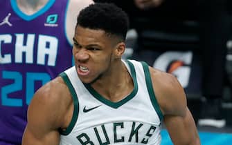 CHARLOTTE, NORTH CAROLINA - JANUARY 30: Giannis Antetokounmpo #34 of the Milwaukee Bucks reacts following a dunk during the third quarter of their game against the Charlotte Hornets at Spectrum Center on January 30, 2021 in Charlotte, North Carolina. NOTE TO USER: User expressly acknowledges and agrees that, by downloading and or using this photograph, User is consenting to the terms and conditions of the Getty Images License Agreement. (Photo by Jared C. Tilton/Getty Images)