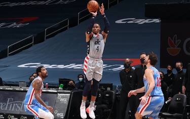 WASHINGTON, DC -  JANUARY 31: Russell Westbrook #4 of the Washington Wizards shoots the game winning shot against the Brooklyn Nets on January 31, 2021 at Capital One Arena in Washington, DC. NOTE TO USER: User expressly acknowledges and agrees that, by downloading and or using this Photograph, user is consenting to the terms and conditions of the Getty Images License Agreement. Mandatory Copyright Notice: Copyright 2021 NBAE (Photo by Stephen Gosling/NBAE via Getty Images)
