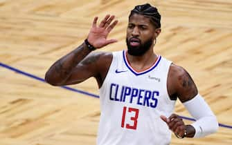 ORLANDO, FLORIDA - JANUARY 29: Paul George #13 of the LA Clippers reacts during the first quarter against the Orlando Magic at Amway Center on January 29, 2021 in Orlando, Florida. NOTE TO USER: User expressly acknowledges and agrees that, by downloading and or using this photograph, User is consenting to the terms and conditions of the Getty Images License Agreement. (Photo by Douglas P. DeFelice/Getty Images)