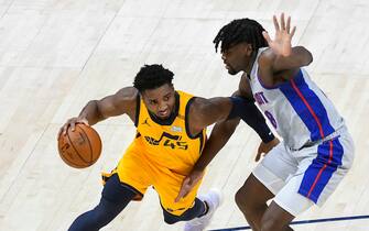 SALT LAKE CITY, UTAH - FEBRUARY 02: Donovan Mitchell #45 of the Utah Jazz drives around Isaiah Stewart #28 of the Detroit Pistons during a game at Vivint Smart Home Arena on February 2, 2021 in Salt Lake City, Utah. NOTE TO USER: User expressly acknowledges and agrees that, by downloading and/or using this photograph, user is consenting to the terms and conditions of the Getty Images License Agreement. (Photo by Alex Goodlett/Getty Images)